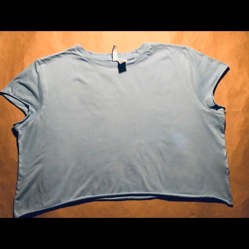 H&M’s light blue cropped shirt.